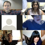 Grid of twelve screeens in a zoom session, most participants holding out their arms and smiling