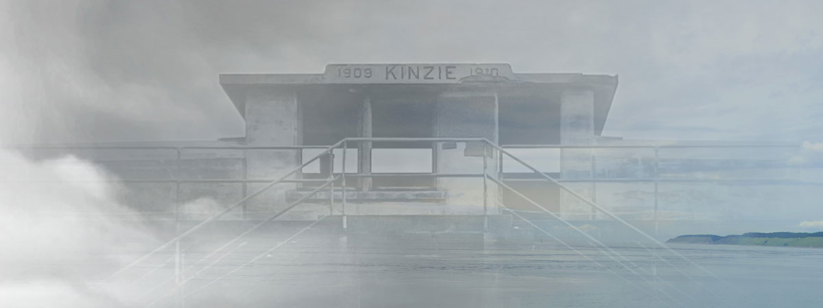 Image of an abandoned fort with the words 1909 KINZIE at the top, shrouded in fog