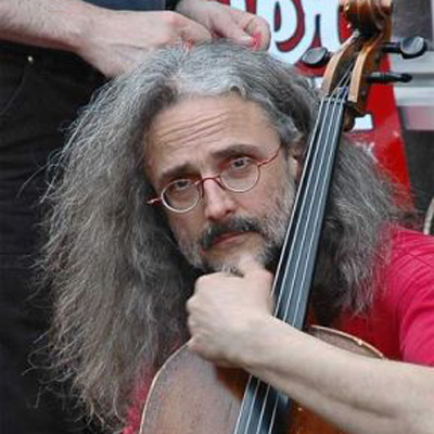 Photo of Jay Hamilton holding a cello