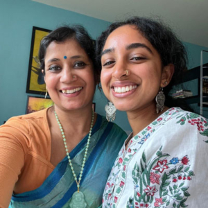 Anika Tara and Shahana Dattagupta stand close together, smiling.