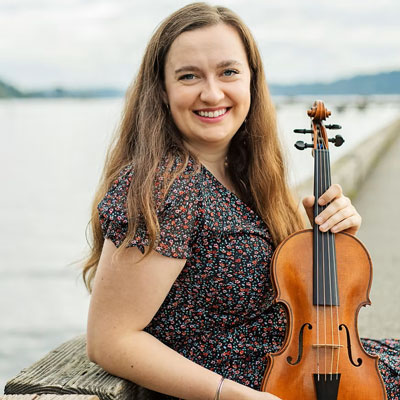 Eleanor Legault, holding a violin